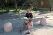 Tom hacks near the beach