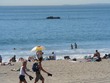 Beach and rock near Santa Monica Pier. We saw many dolphins frolicking around this rock as we watchd-- very nice!