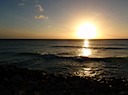 Crossed waves at sunset