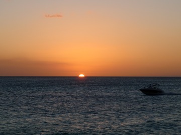 Sunset with motorboat