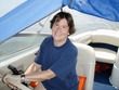 Kathy driving the boat