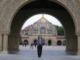 Kathy in the archway in front of Stanford's main quad
