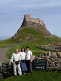 Ben, Kathy and Ross with Lindisfarne Castle behind.
