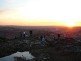 Peter and Ross (leftmost standing) enjoy the sunset from Arthur's Seat.