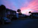 More sunset at our hotel.  With rental car and happy campers.