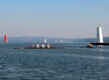 Two fours on the inlet.  Note the left on ie four single oarsmen, the right one has four PAIRS and a cox facing forward (you can just see his head).